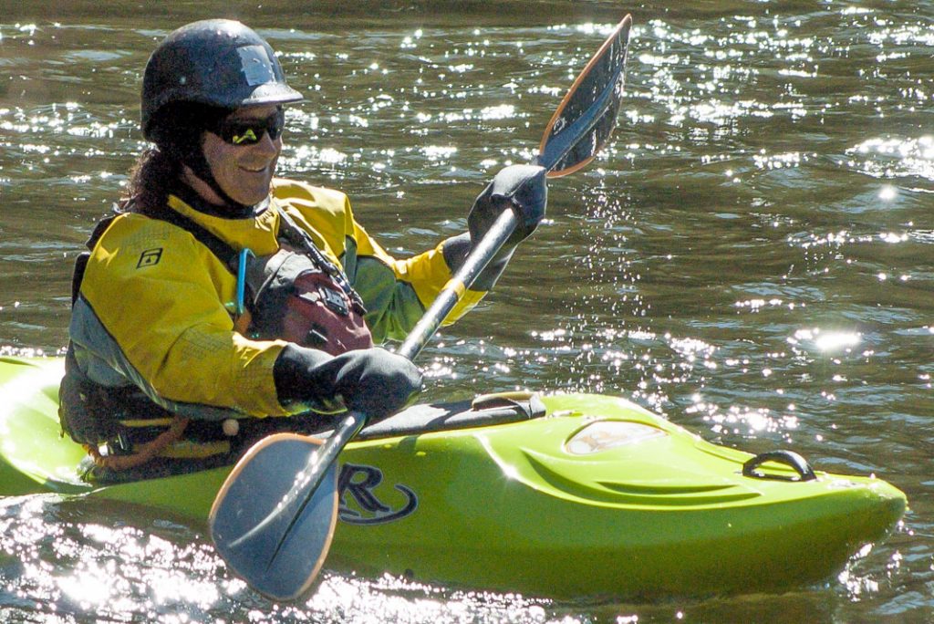 Person using kayak pogies