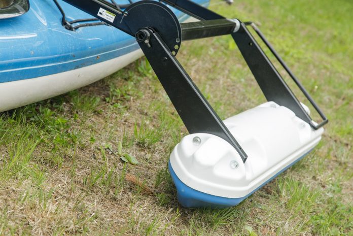An outrigger on the side of a kayak