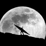 How To Put A Kayaker On The Moon A kayaker silhouetted against the full moon