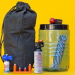 Bear Safety Gear for Camping Camping gear for bear safety on a yellow background.