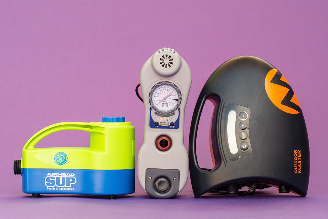 Three electric sup pumps on a purple background