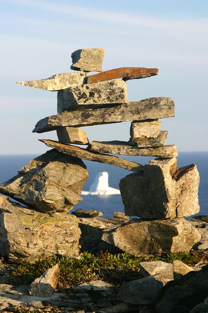 A cairn marks a coastal route in Newfoundland