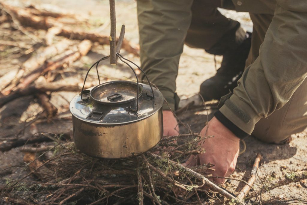 Cooking over a backcountry campfire