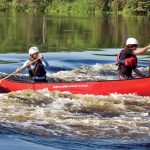 Boat Review: Mad River Legend 16 Canoe Man and woman tandem canoeing in the Mad River Legend 16 canoe