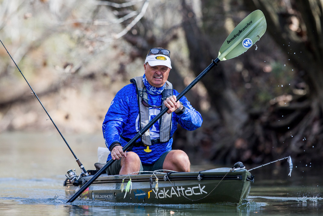 Tim perkins fishes from a kayak with expert rigging for river fishing