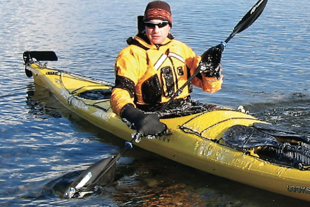 Man paddling a Necky Looksha V sea kayak