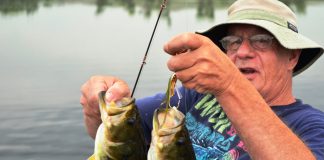 Fishing Guru Stan Sheid shows off a double. Photo:Ben Duchesney