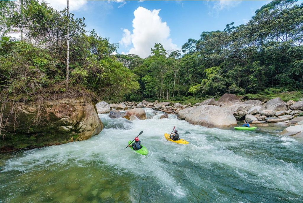 kayakers on the lower Piatua River. Photo by Jeremy Snyder