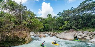 kayakers on the lower Piatua River. Photo by Jeremy Snyder