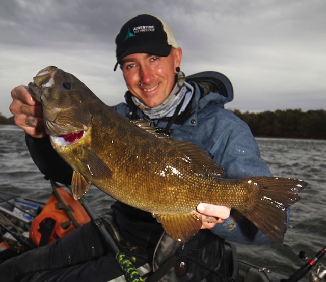 Jed Plunkert shows that any weather is good enough to catch smallmouth bass. Photos: Courtesy Jeff Little