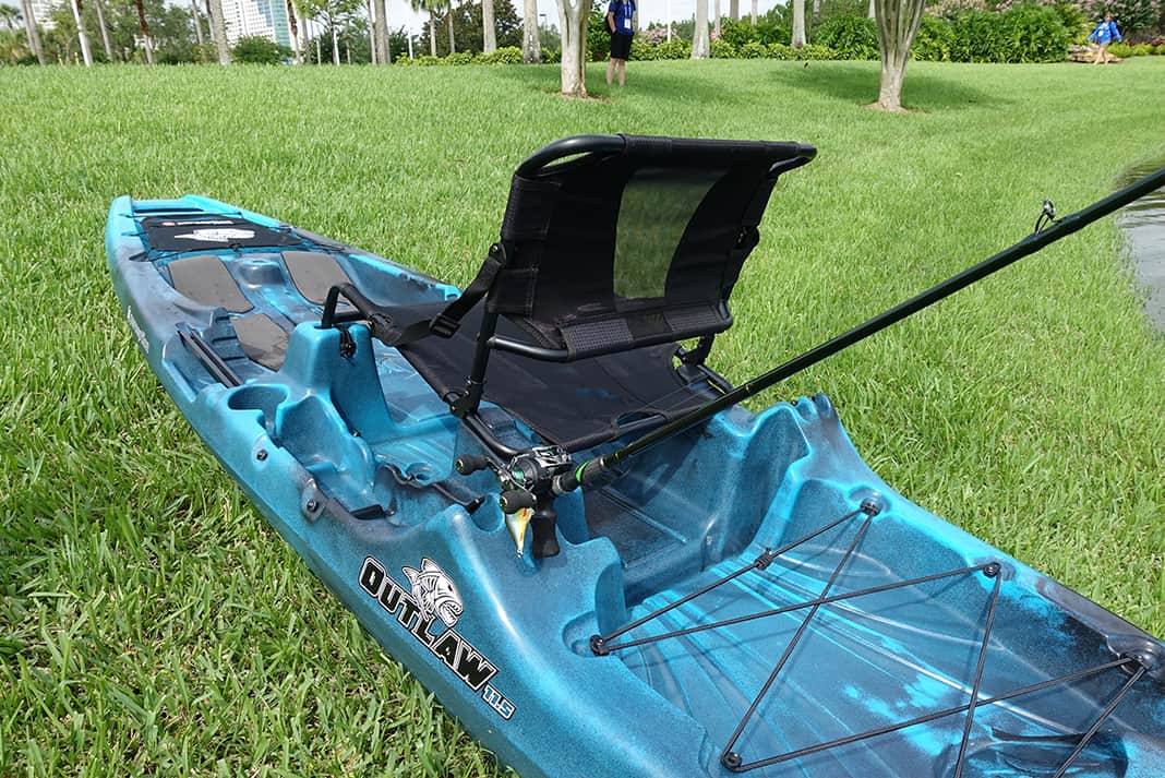 Perception Kayaks Outlaw 11.5 Fishing Kayak sits on grass