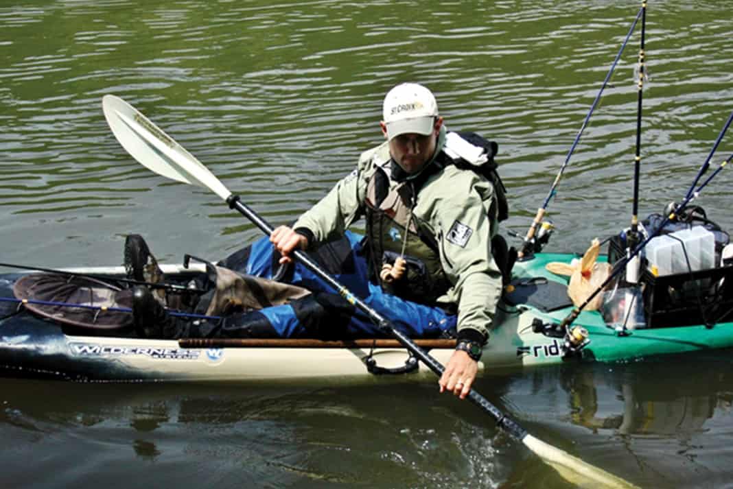 Kayak angler paddling quietly