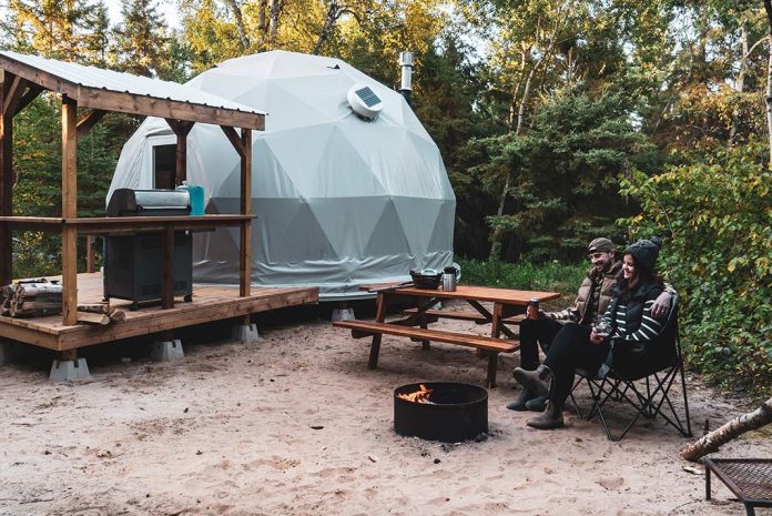 Campers staying in geodesic domes at Elk Island Retreat