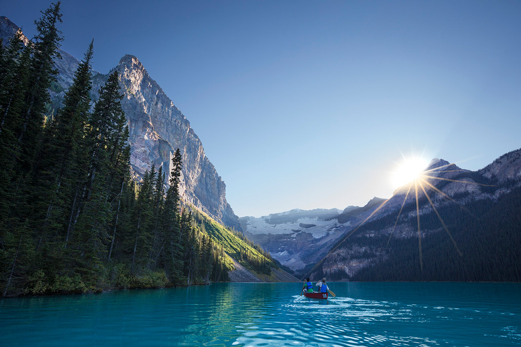 Canoeing towards the mountains of Lake Louise
