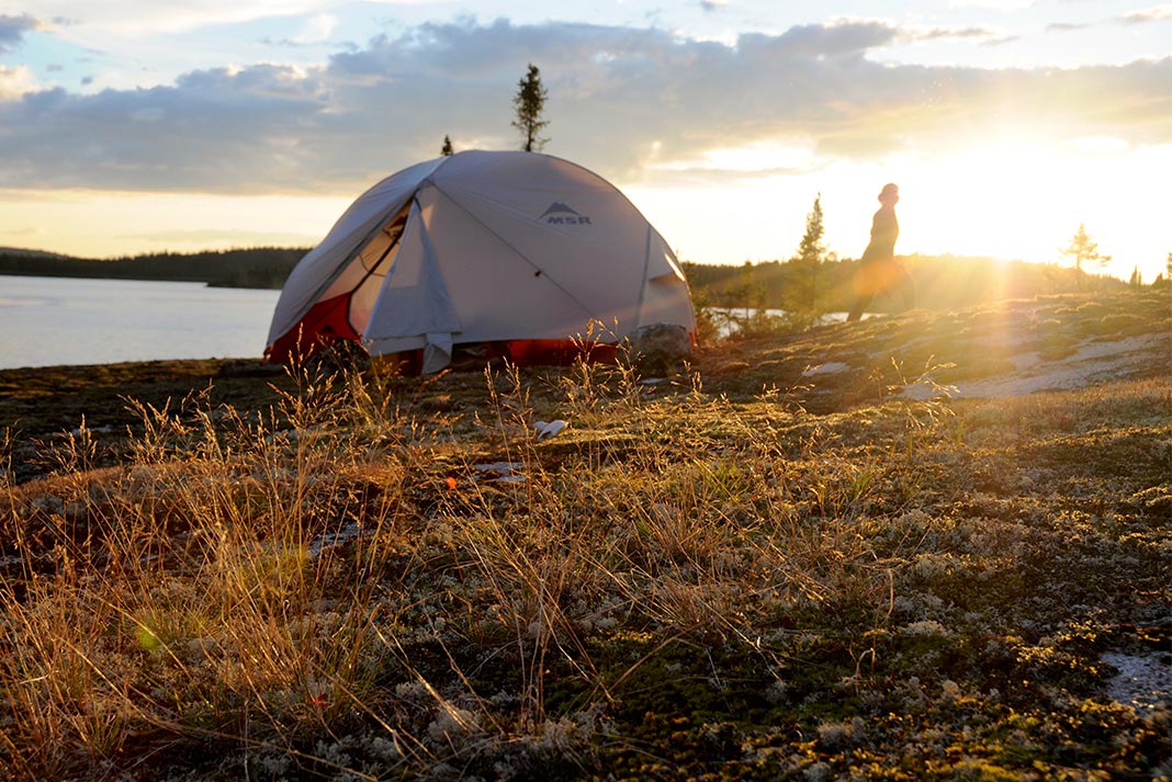 A tent setup on the shore of Saguenay