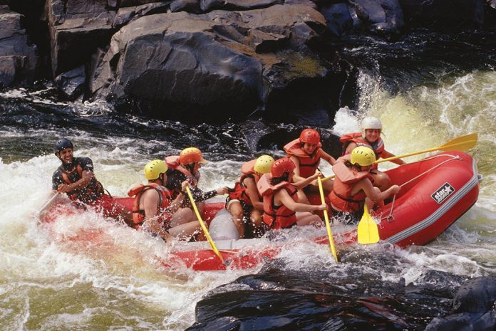 A group hits the whitewater rapids in Montreal