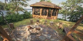 Photo of gazebo and firepit on the edge of a lake