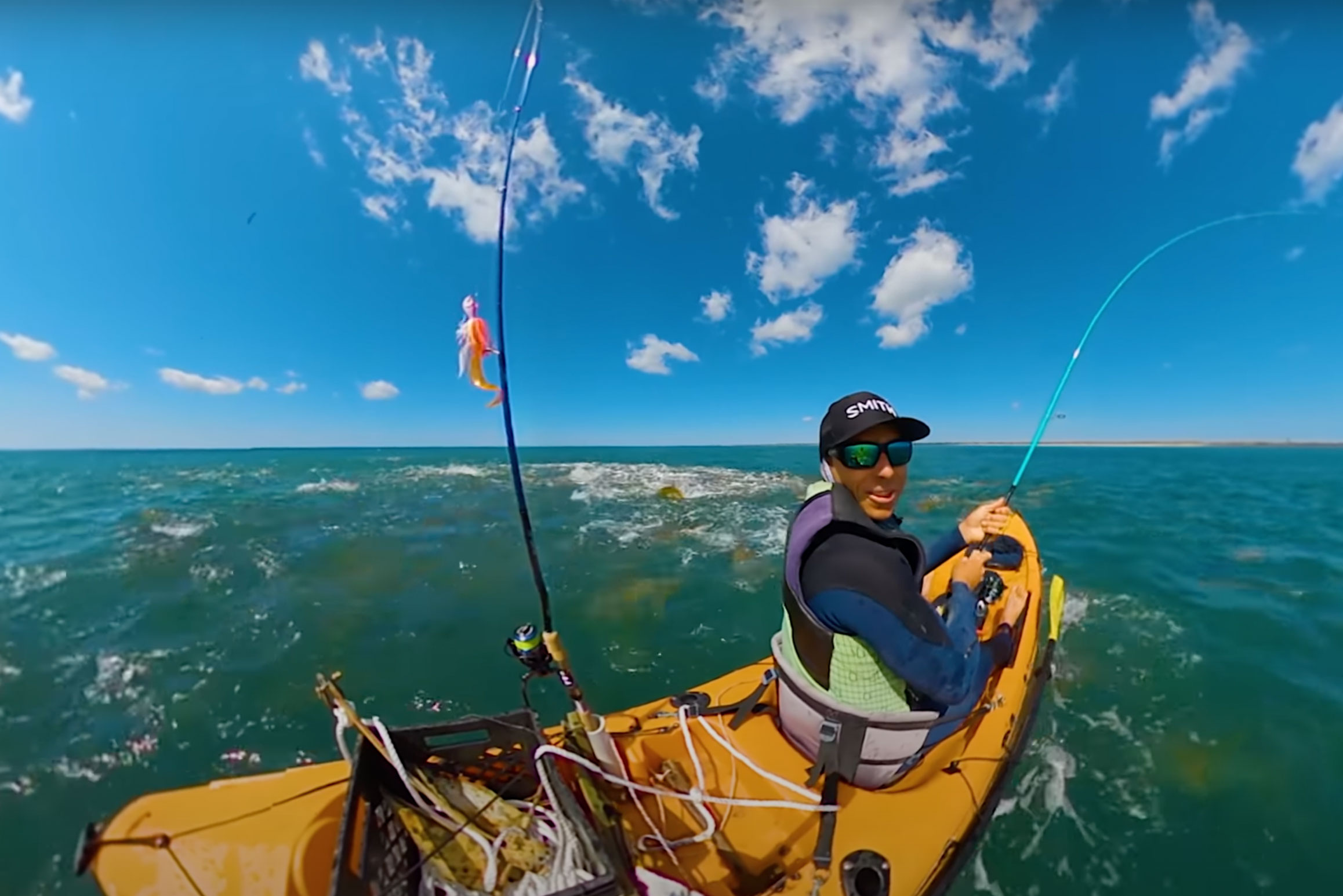 Brett Barley is swarmed by red drum while kayak fishing in the Outer Banks