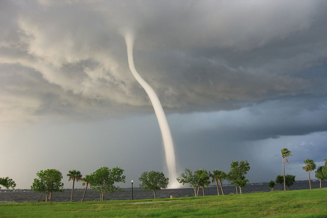 large tornadic waterspout in Punta Gorda, Florida poses greater threat than a fair-weather waterspout