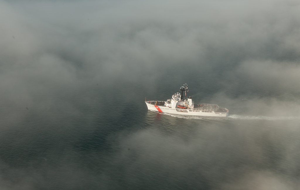 Fog hampers the Coast Guard's search for the missing kayaker