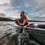 The Ultimate Training Program For Paddlers Man paddling sea kayak