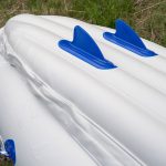The five tubes of the I-beam hull provide a rigid platform constructed of sun- and saltwater-resistant 38 mil PolyKrylar (K80 PVC) that’s rated to withstand up to class III rapids. Two fins and the side chines of the hull help it to paddle in a straight line. | Photo: Colin Field