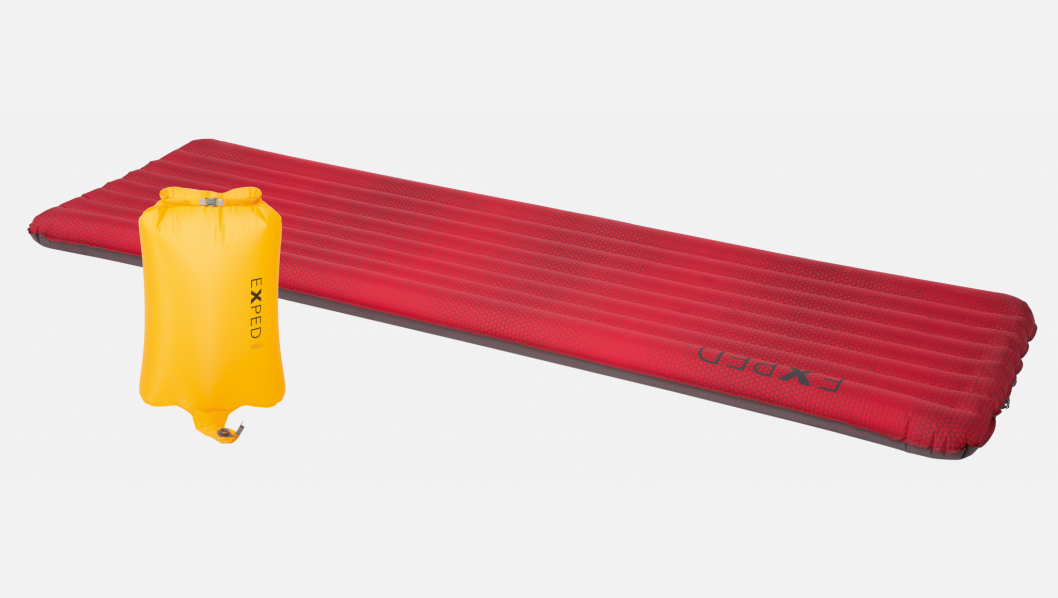 Red sleeping pad with yellow drybag