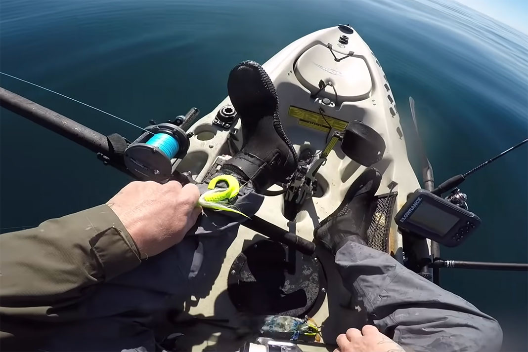 YouTuber Mr. Markus is hit by a mantis shrimp while kayak fishing
