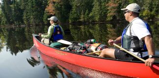 man and woman embark on a mistake-free wilderness canoe trip