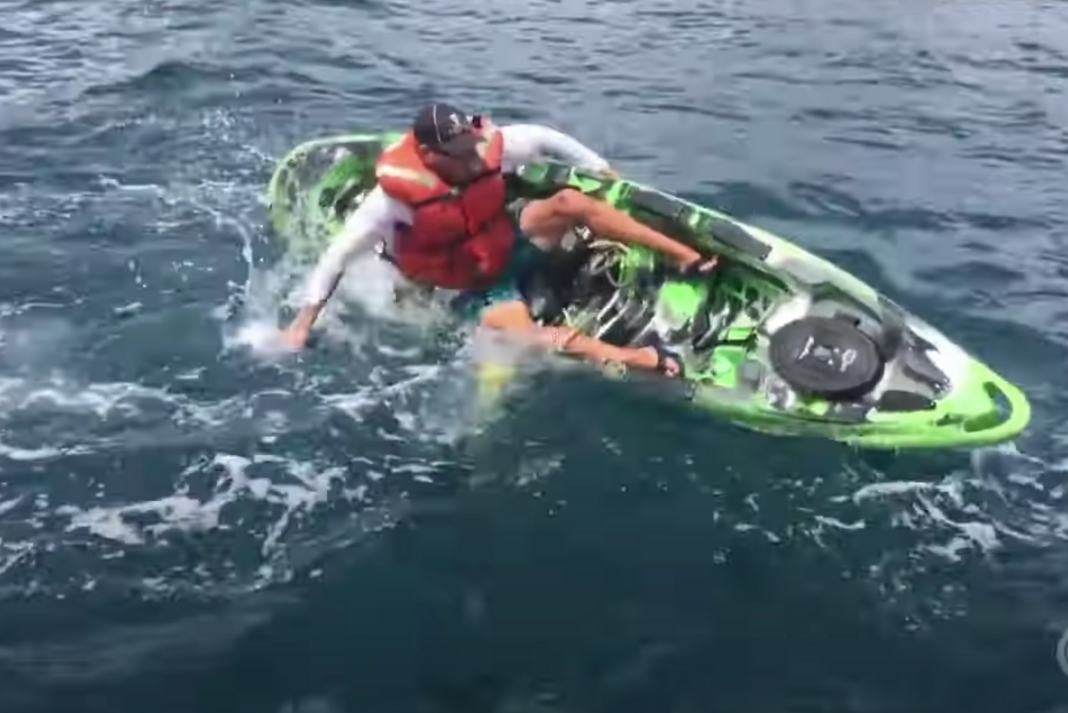 fishing-kayak-capsized-by-shark