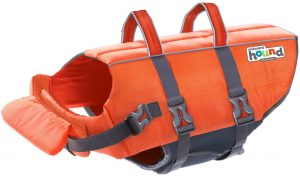 Orange life jacket for a dog with handles