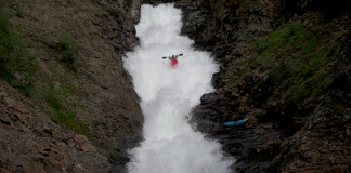 Bren Orton charges down a whitewater slide in Norway.