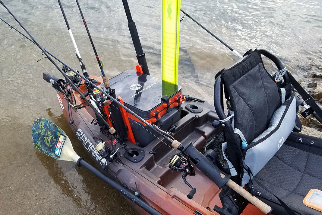 Wilderness Systems fishing kayak kitted out with kayak crate and rod holders