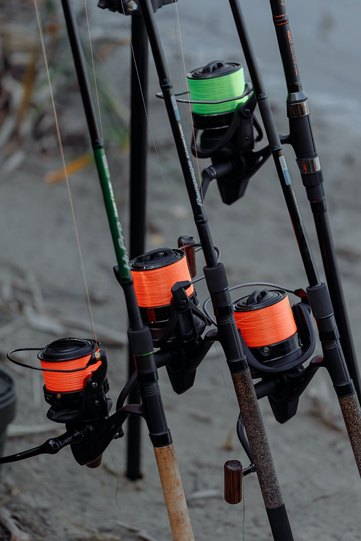 a collection of rods and reels