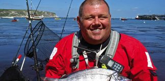 Swanage tournament angler holds up a black bream