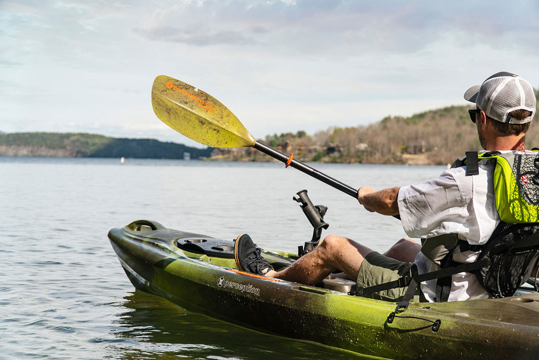 know it all angler paddles a fishing kayak