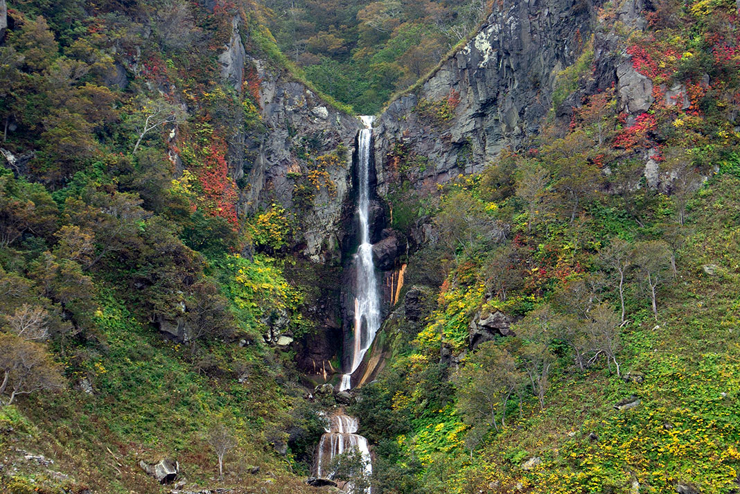 Waterfall cascading down cliff face