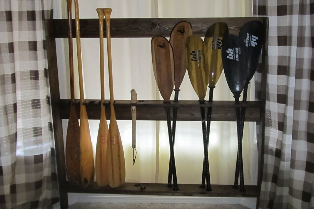 a DIY paddle rack with paddles
