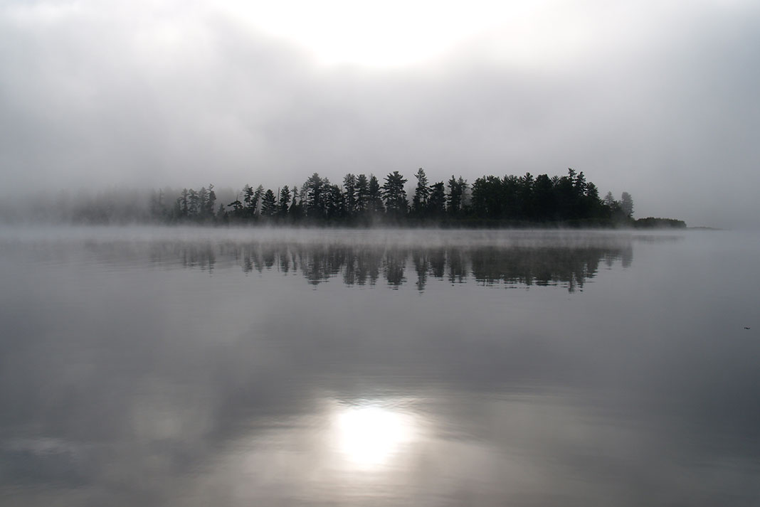 Morning mist over Lake Traverse in Algonquin Park, a hotspot for fall muskie fishing