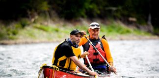two men in a whitewater canoe