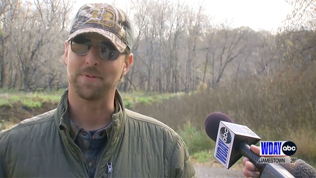 kayak angler interviewed on the TV news about his heron rescue mission
