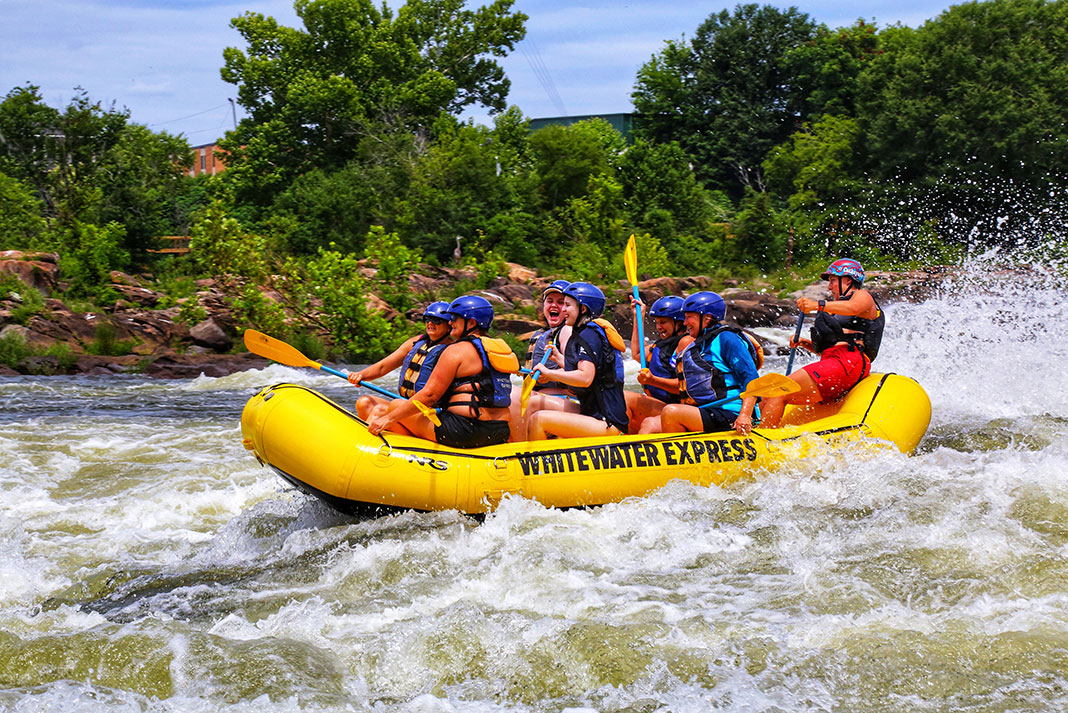 a group goes on a whitewater rafting trip in Alabama