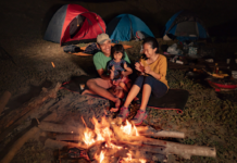 roasting marshmallows is one fun after-dark activity for family camping