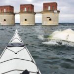 Lone Kayaker Saves Two Men From Sinking Motorboat The view from Allen’s boat as he rushed to rescue two men from a capsized motorboat. | Photo courtesy Allen Hutto