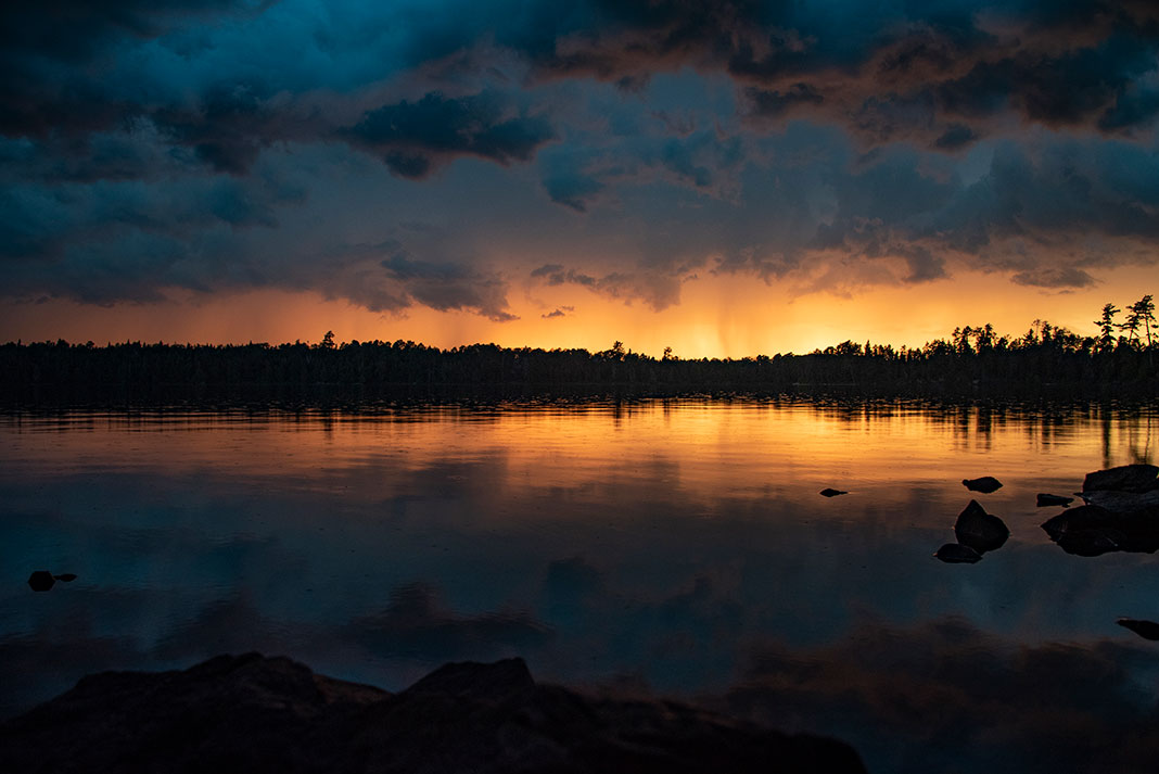 dramatic sunset over a lake at Boundary Waters