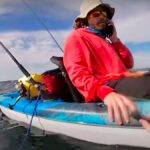 Who Do You Call When Your Kayak Sinks? When Christian Nelson’s kayak turned turtle 3 miles offshore, a friend’s cell phone was his only way to call for help. | Photo Courtesy Christian Nelson