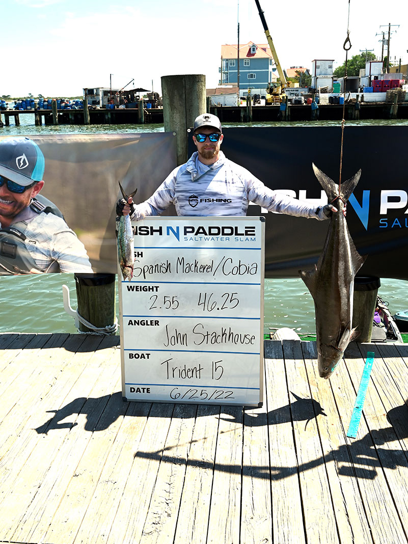 winner of the Fish N Paddle Saltwater Slam poses with his catches