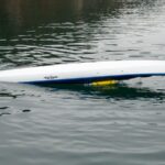Paddler Risks All To Save Kayaker From Freezing Lake A frame grab from Sally Wallick’s video camera captures the scene as she saves the capsized kayaker from freezing. | Feature photo: Sally Wallick via Storyfull