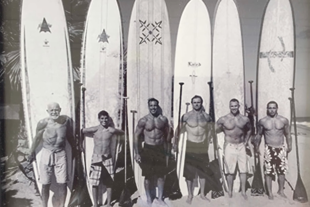 Laird Hamilton and group of standup paddlers