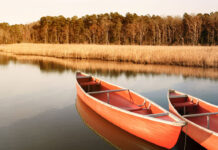 Two red plastic canoes